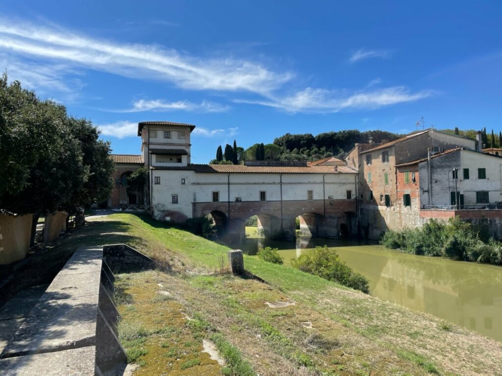 Villa, green grass and mote