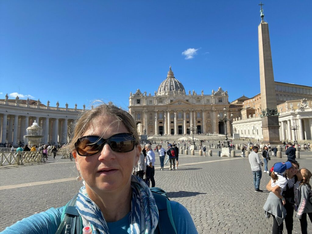 Woman taking a selfie of St. Peter's Basilica